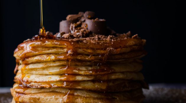 pile of pancake with honey