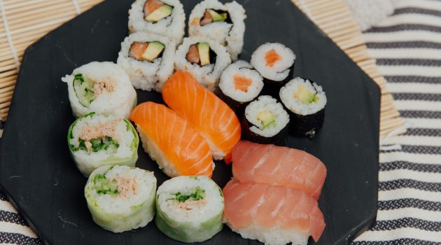 assorted sushi and rolls on plate