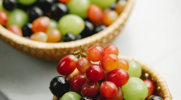 grapes in wicker bowls in daylight